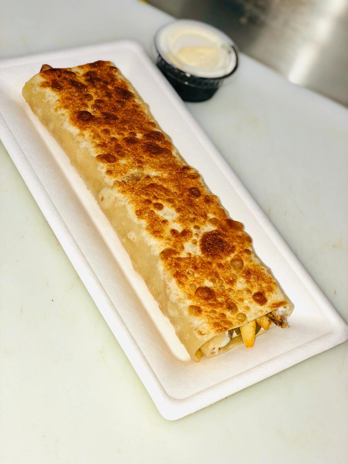 Crispy saj-baked shawarma wrap